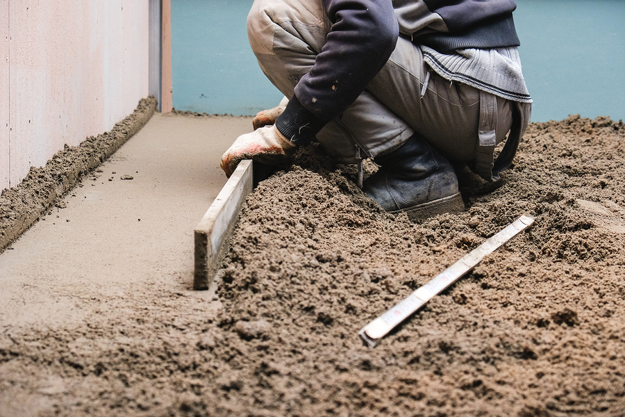 man smoothing the soil