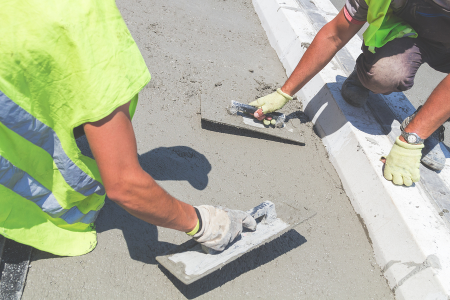 men smoothing the concrete